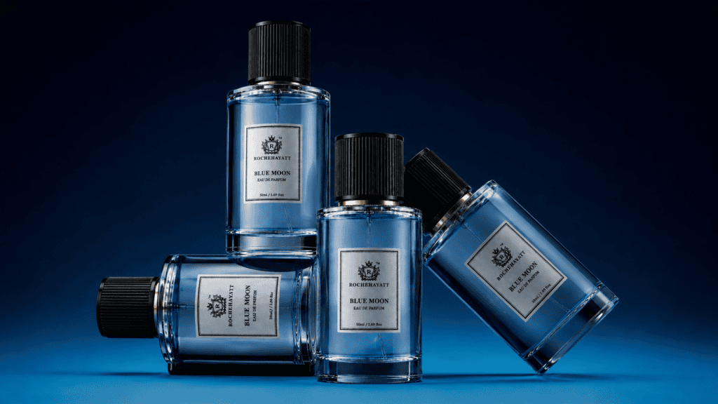 RocheHayatt Blue Moon Eau de Parfum bottles arranged on a dark blue luxury background.