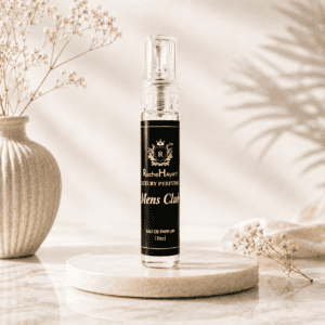 ocheHayatt Mens Club 10ml Eau de Parfum tester bottle displayed on a beige marble podium with soft natural lighting, dried flowers, and a premium minimalist background.